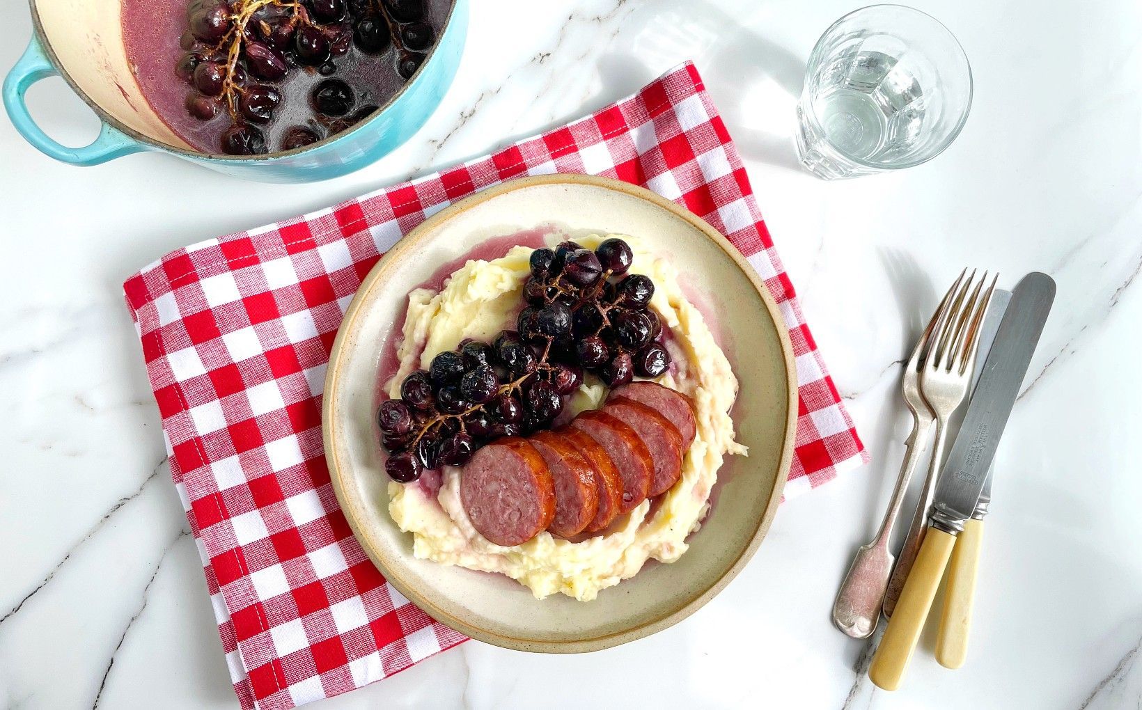 Morteau Sausage Braised with Dark Muscat Grapes